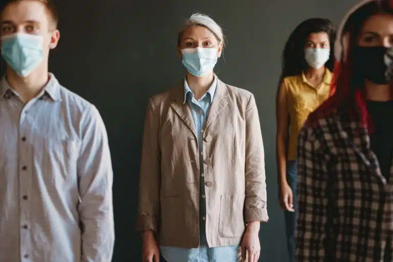 eESI Live Webinar: COVID-19: Answering Your Burning HR Questions people wearing masks